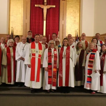 Clergy group in church attire