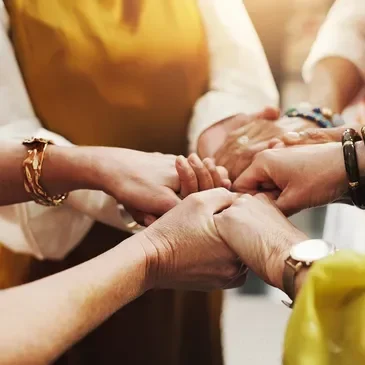 Group of hands holding together