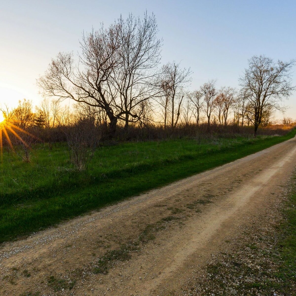 Sunset over a country path